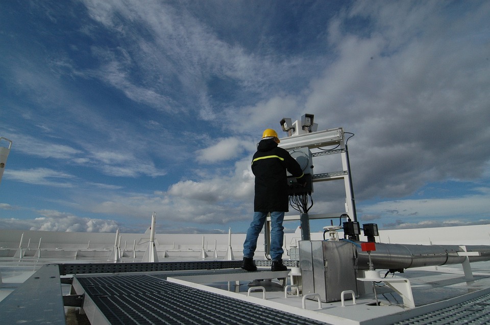 Man repairing a HVAC system